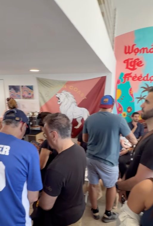 Packed house under the lion flag