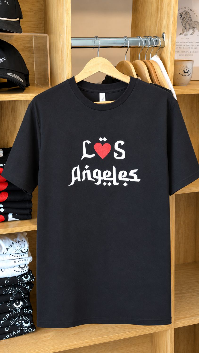 L♥S Angeles tee in Caspian Gothic typography on the rack at Caspian Coast Coffee, Venice